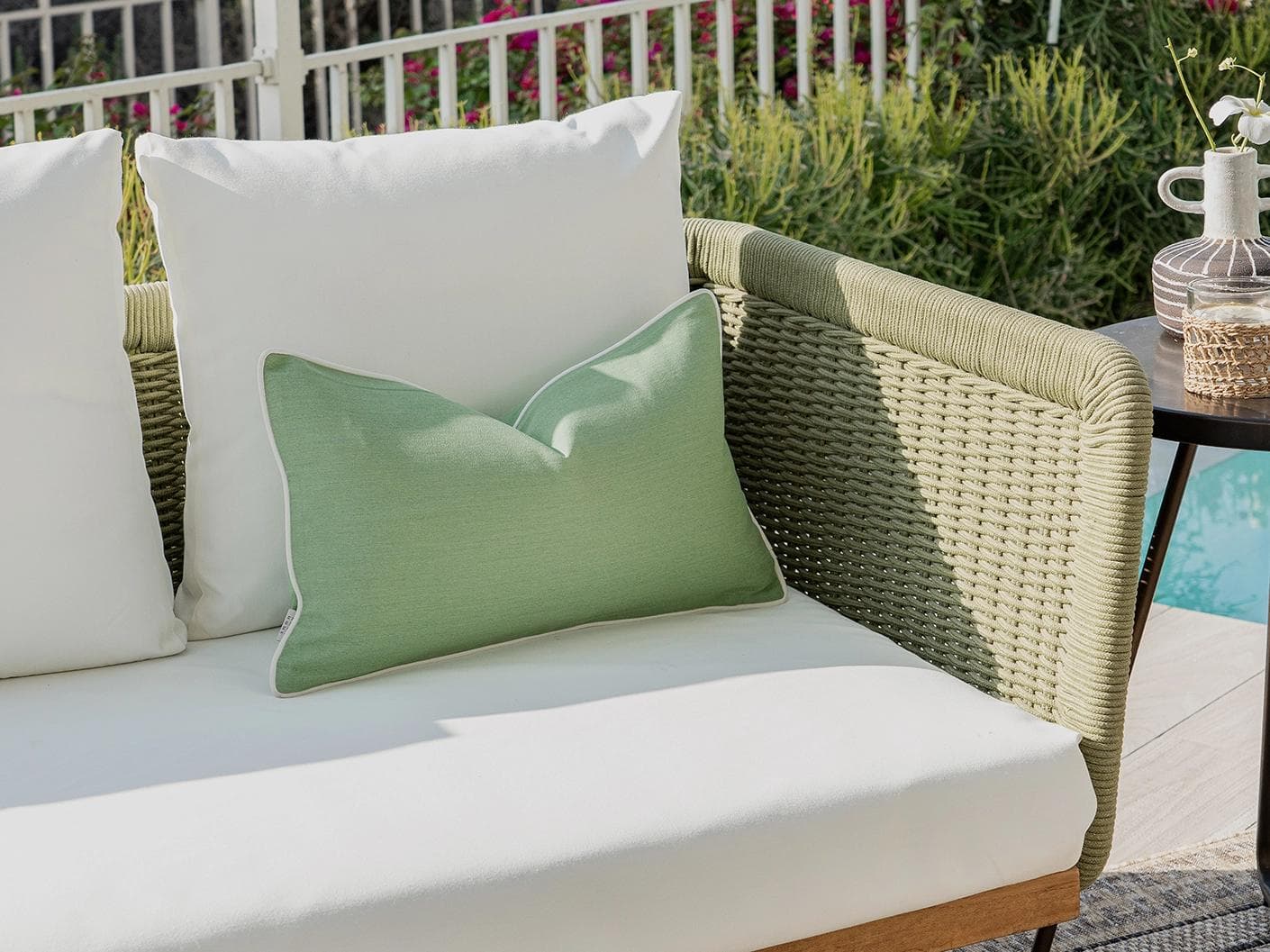 Aelia Fern II cushion in forest green and green, shown in a lifestyle left view as image 2