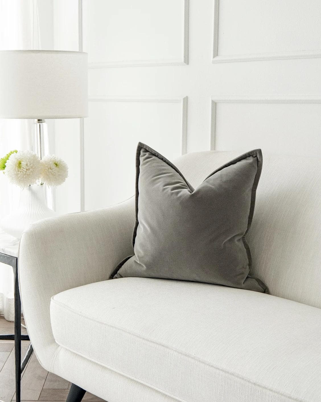 Alessandra Laurent cushion in grey, shown in a lifestyle front view as image 1