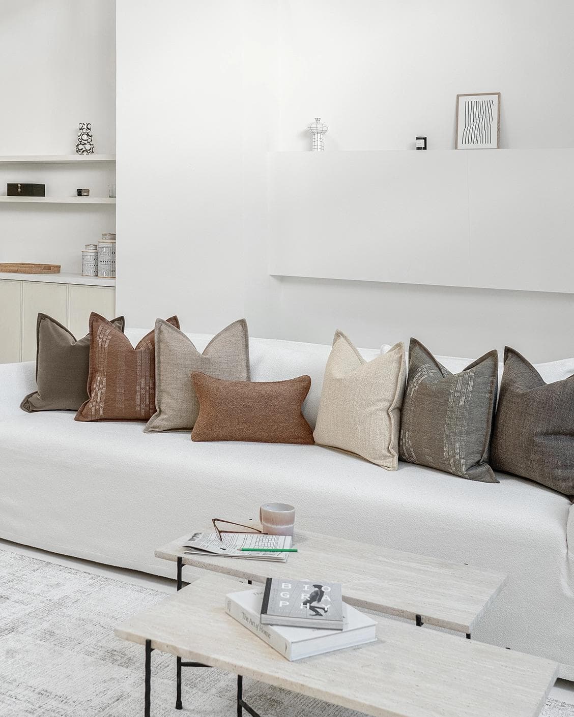Bretty Bundle cushion in brown, charcoal, taupe and beige, shown in a lifestyle right view as image 2
