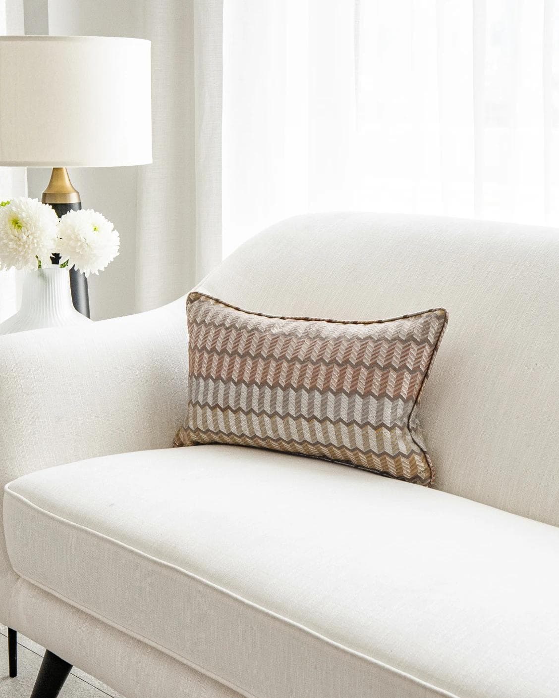 Cecilia Hodler II cushion in orange, yellow and multicolour, shown in a lifestyle right view as image 2