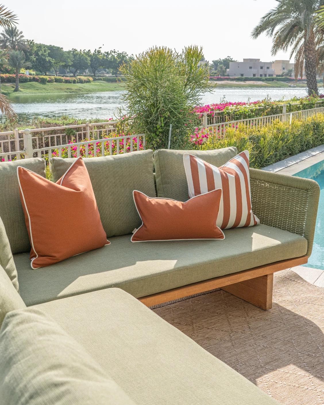 Hisao Bundle cushion in rust, shown in a lifestyle left view as image 2