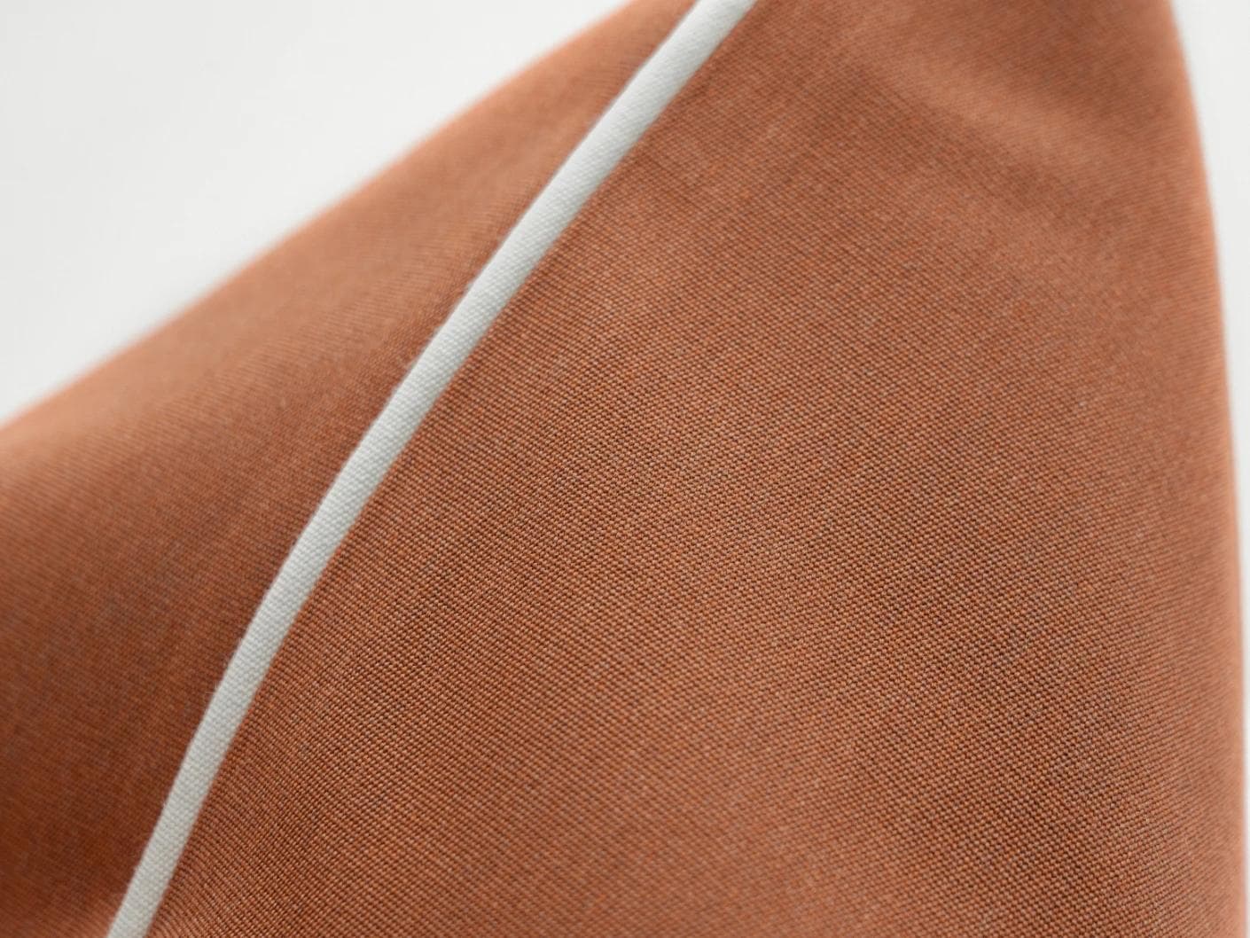Aelia Clay II cushion in rust, shown in a product close-up as image 8