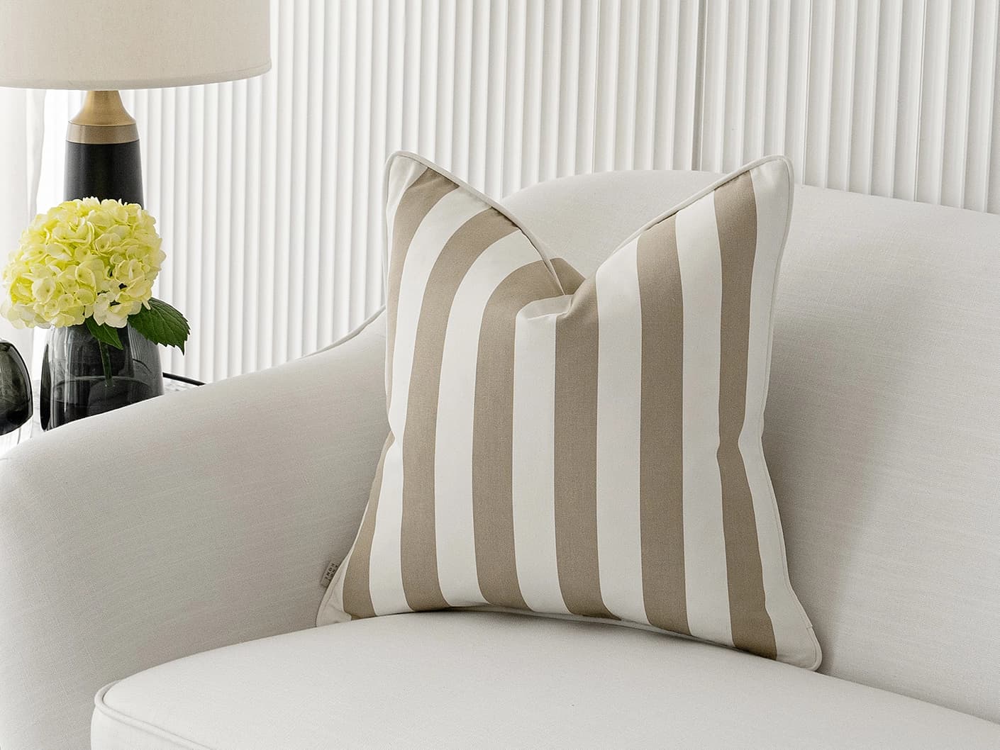 aelia-sandy-beige-outdoor-lifestyle-front-view-cushion-id-AR101877