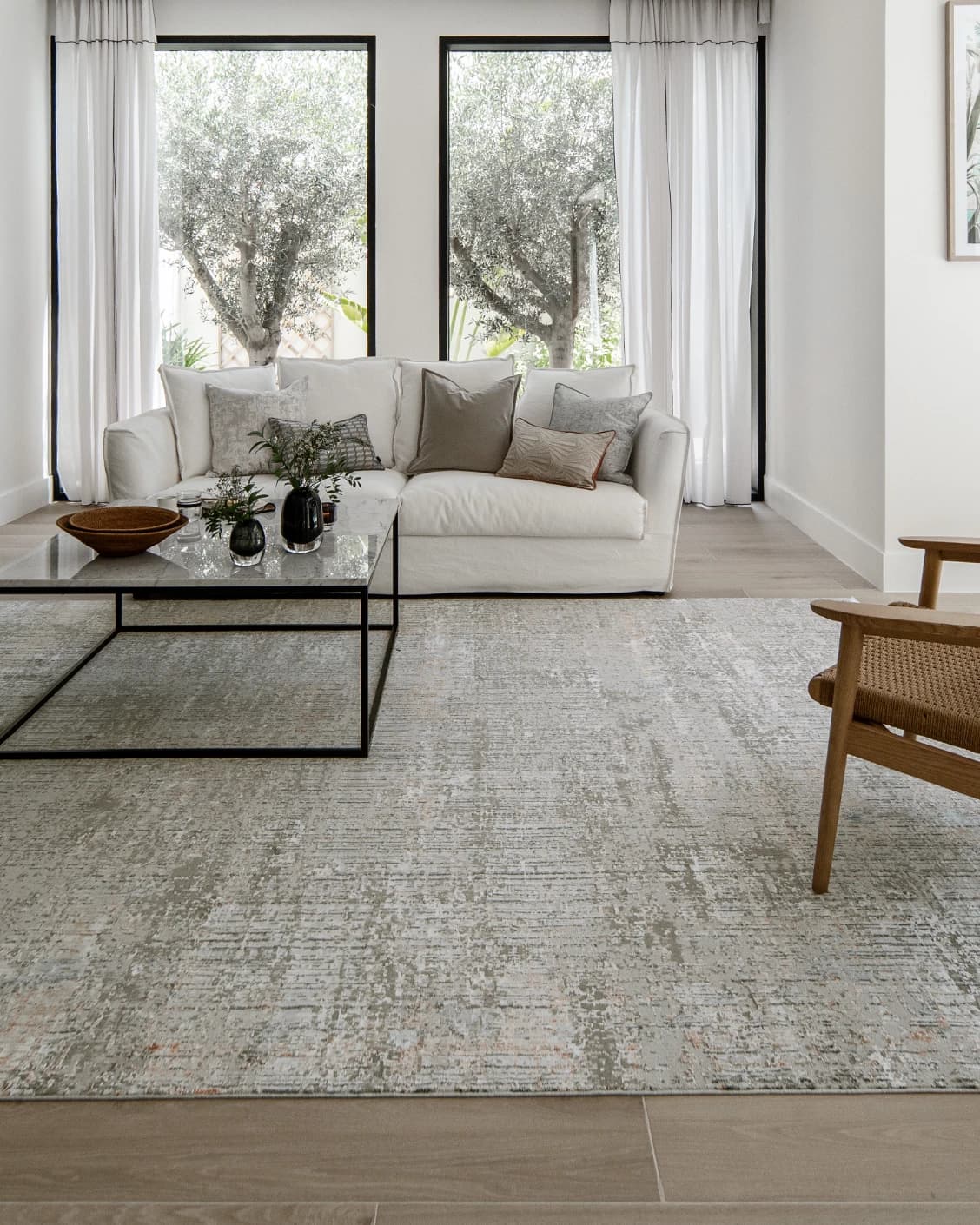 Jacob Sandy carpet in rust and grey, shown in a lifestyle front view as image 5