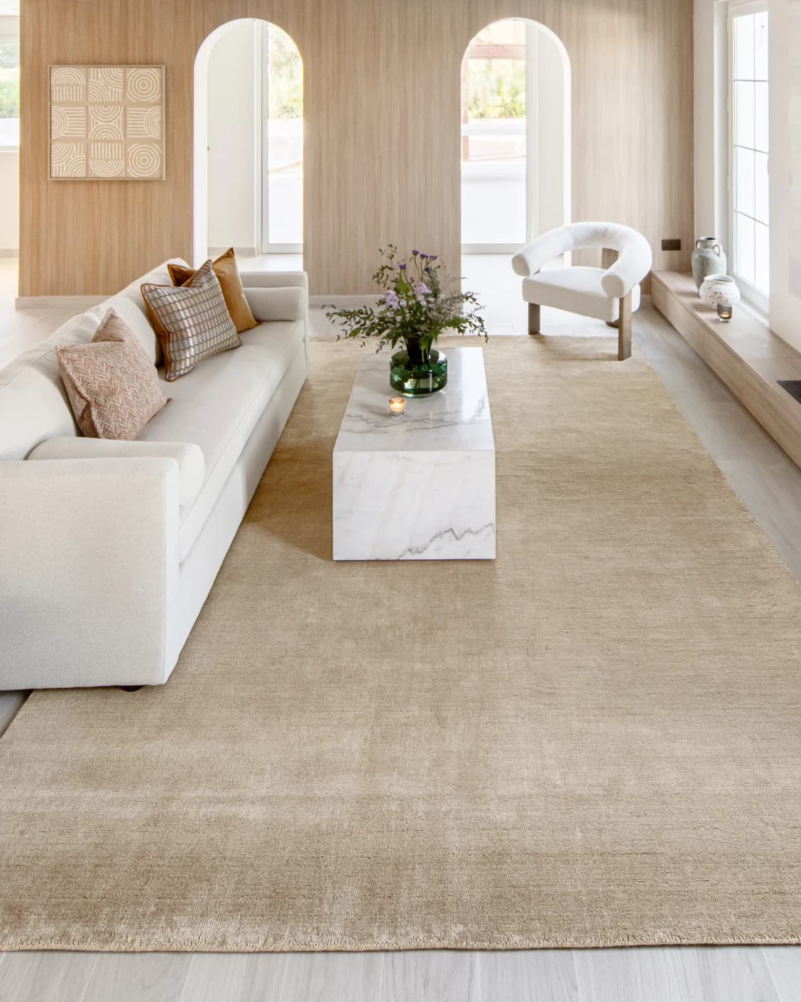 Oscar Sandy carpet in beige, shown in a lifestyle front view as image 5