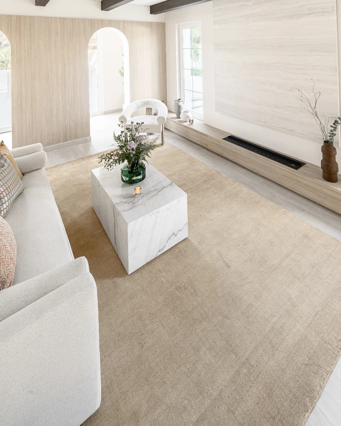Oscar Sandy carpet in beige, shown in a lifestyle left view as image 7