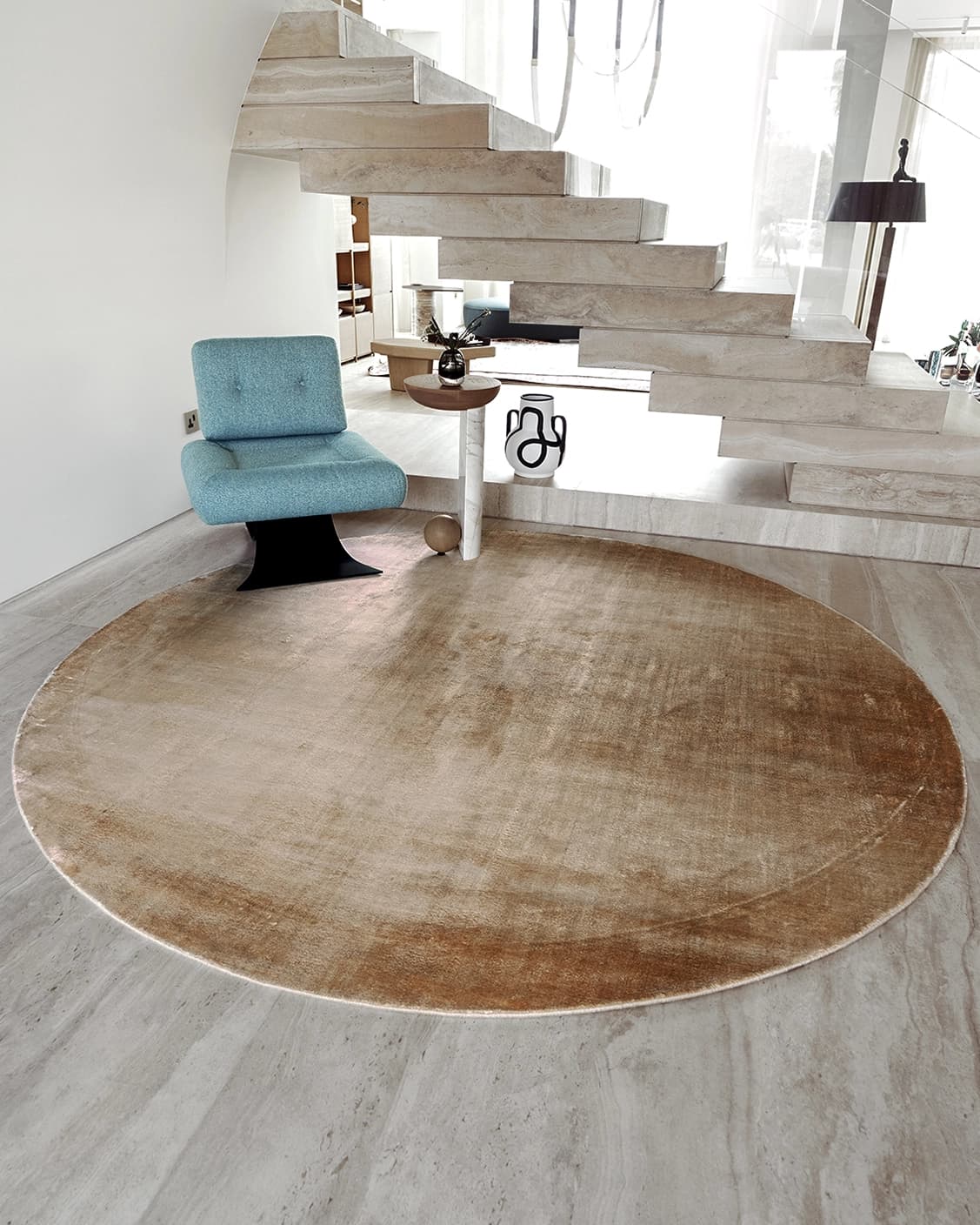 Oscar Sandy Round carpet in sandy and beige, shown in a lifestyle front view as image 2