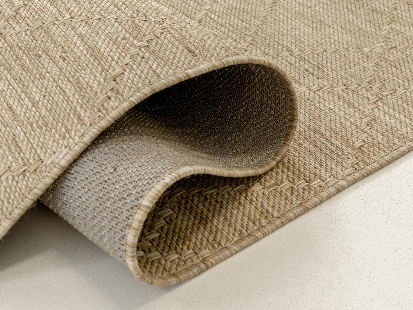 Solana Dune carpets in brown, shown in a product close-up as image 1