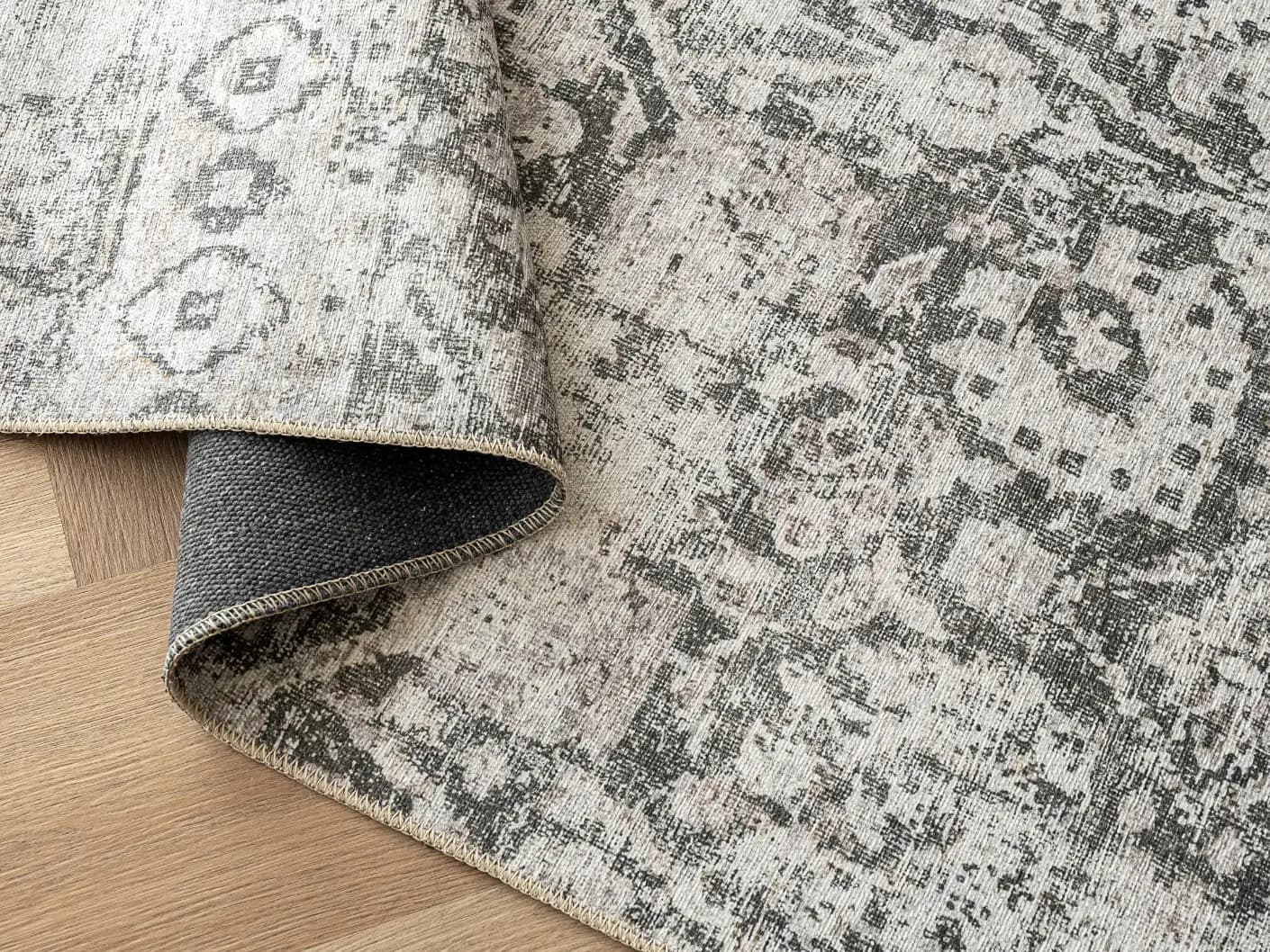 Vince Porcini Runners carpets in grey and charcoal, shown in a product close-up view