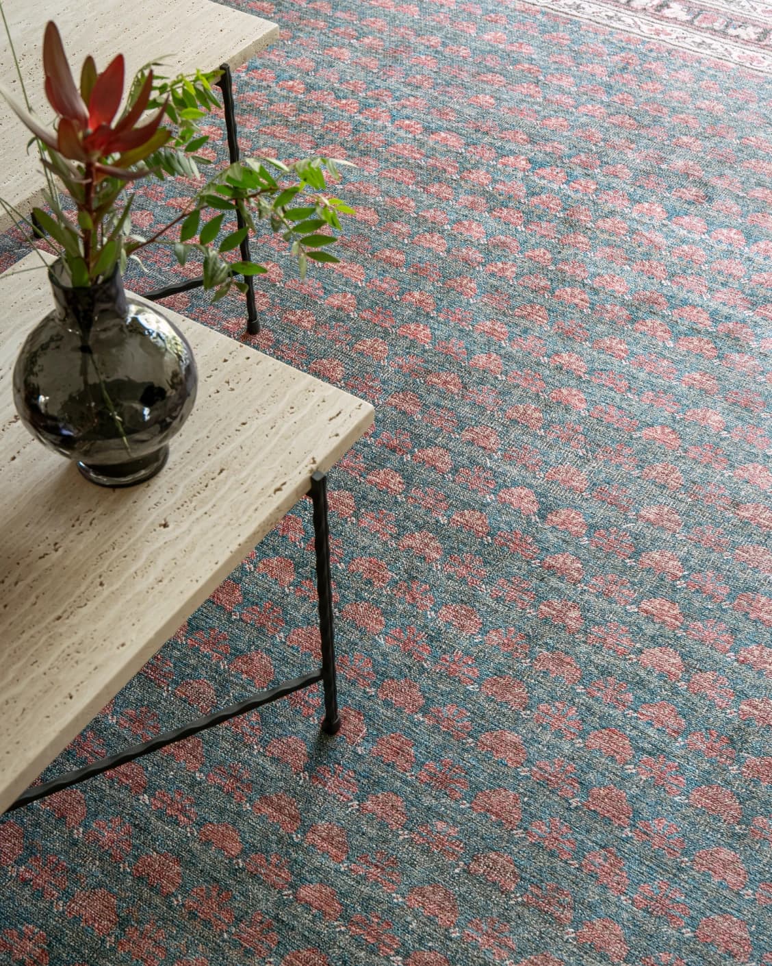 Vincent Denim carpet in blue, rust and multicolour, shown in a lifestyle top view as video image
