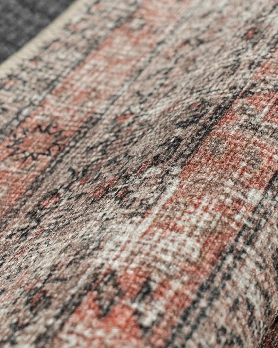 Vincent Terracotta carpet in rust and multicolour, shown in a product close-up as image 37